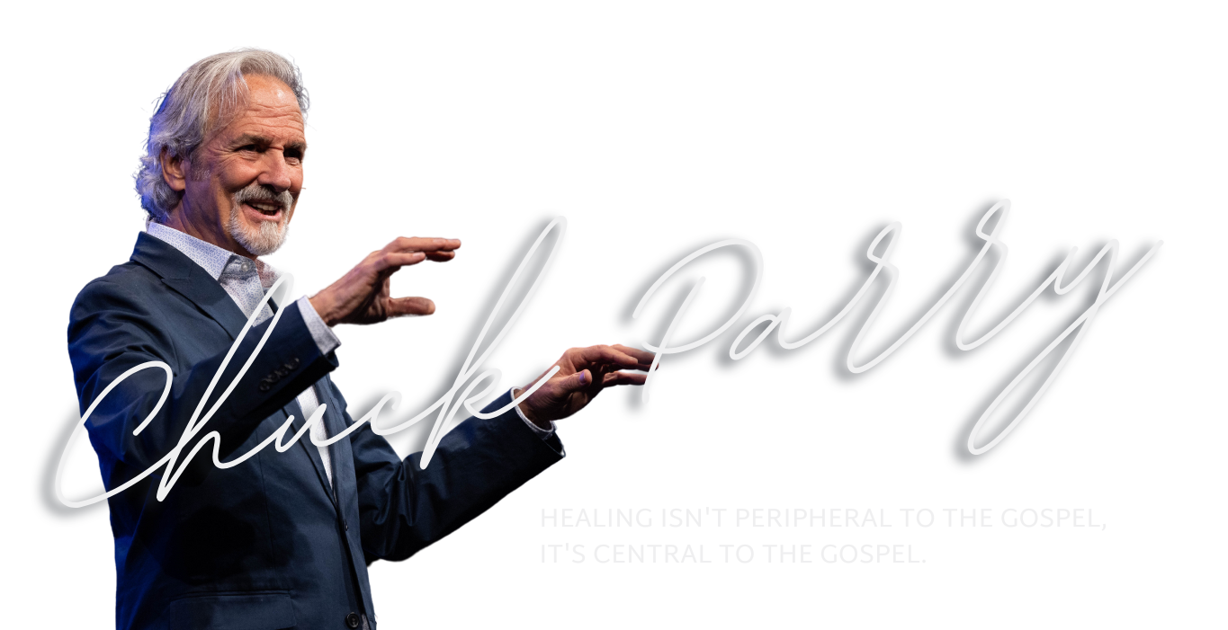 Chuck Parry header image with hands out while preaching